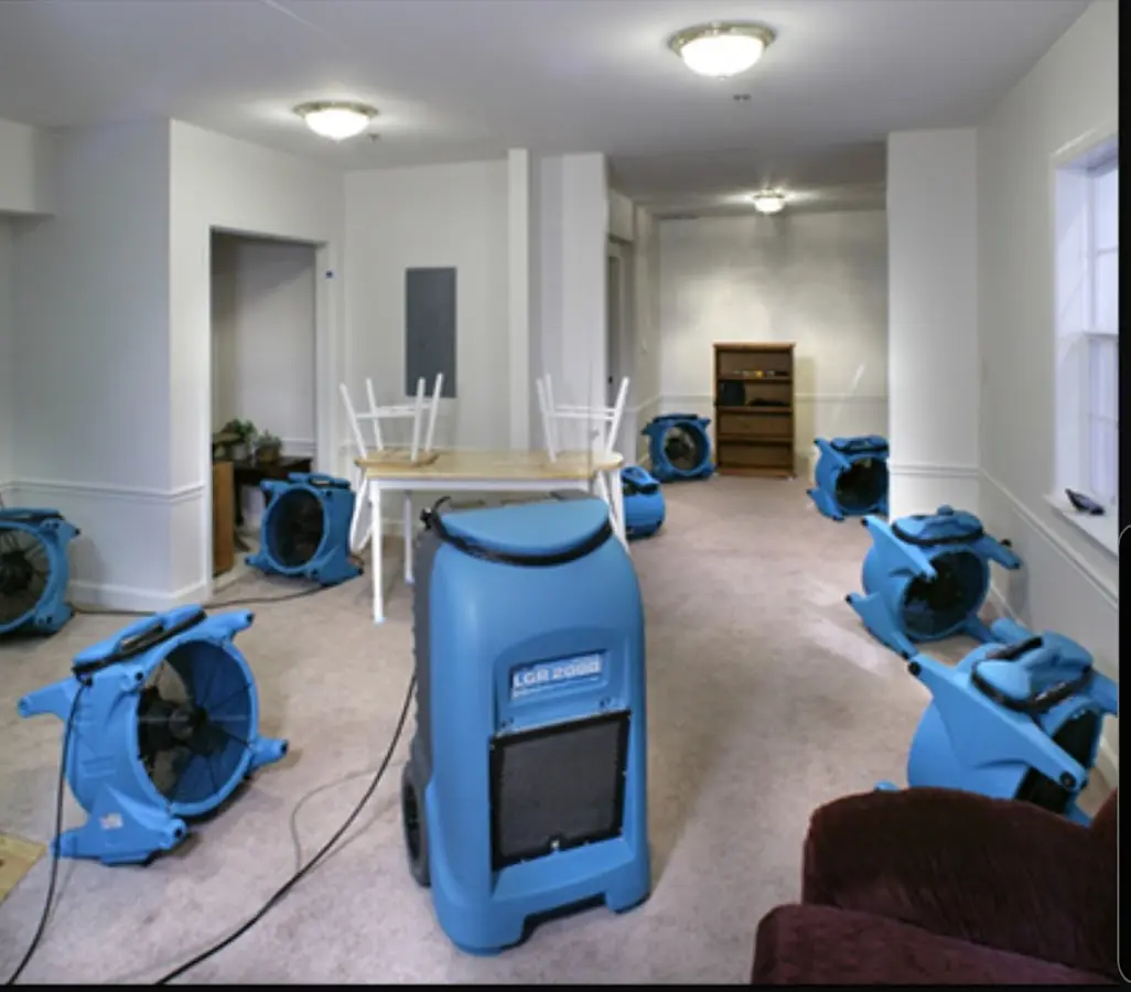 Air movers and dehumidifier setup for Water Extraction & Removal in Gonzales